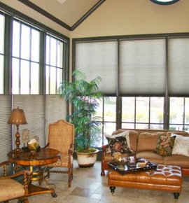 Grey honeycomb shades in living room Photo