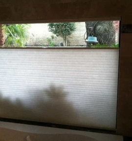 White honeycomb shade Photo
