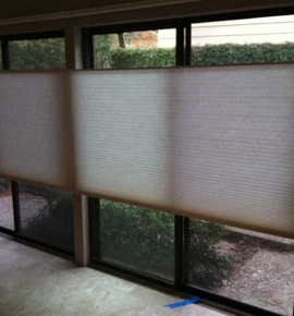 White honeycomb shade in home Photo
