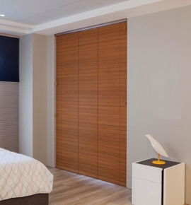 Wood blinds in bedroom Photo
